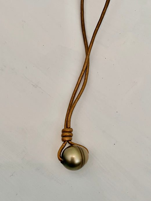 Single Light Chartreuse Tahitian Pearl on Golden Leather